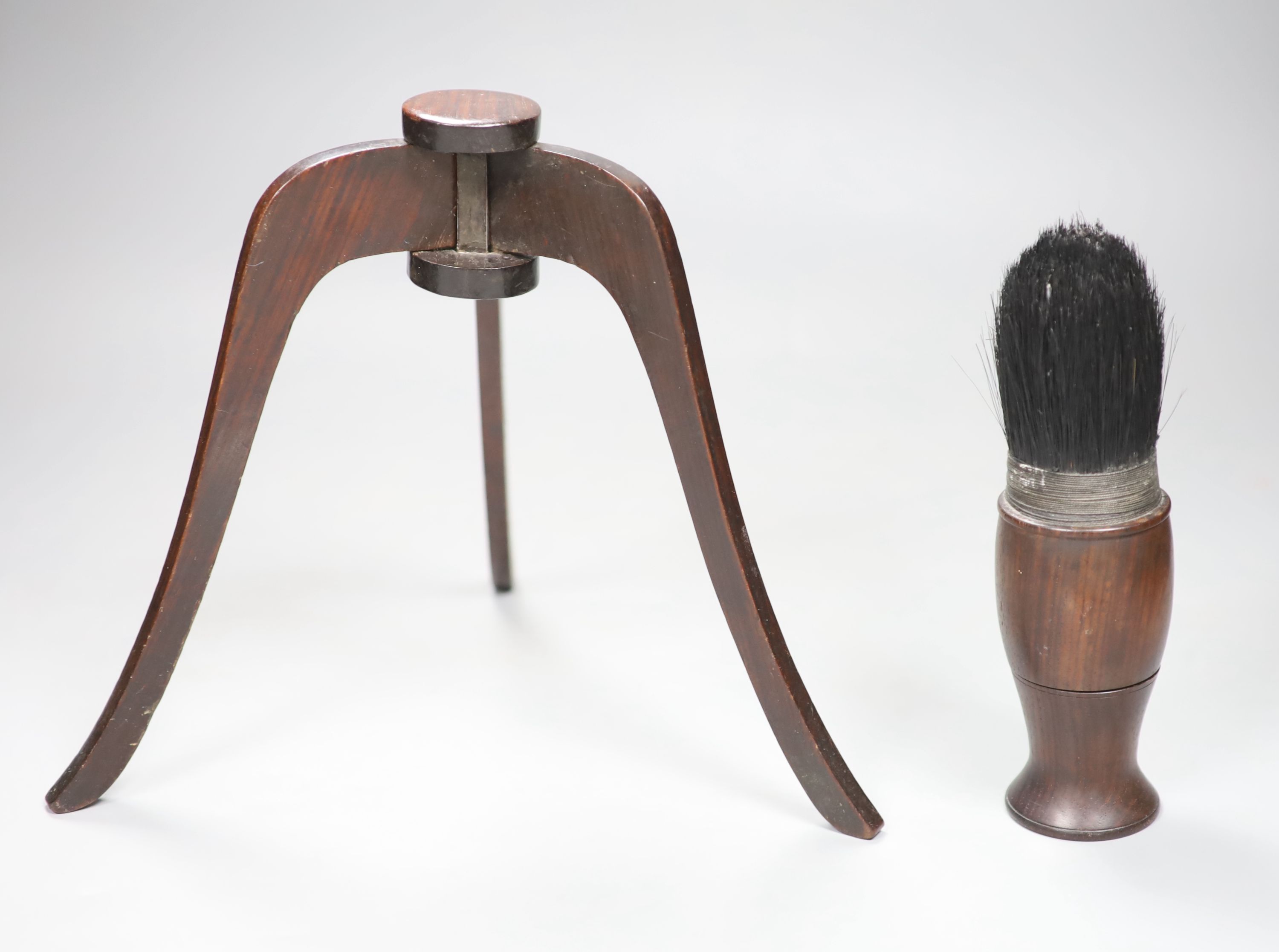 A 19th century Chinese hongmu calligraphy brush, length 19cm, and a hat stand, height 22cm